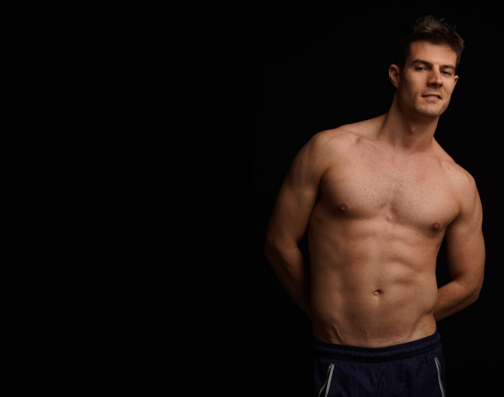 man posing shirtless