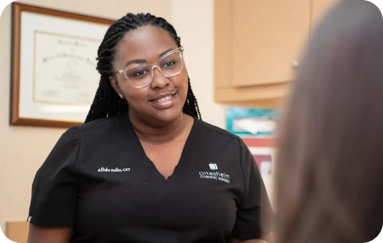 Ditesheim Cosmetic Surgery staff member providing patient consultation and care | Charlotte plastic surgery practice