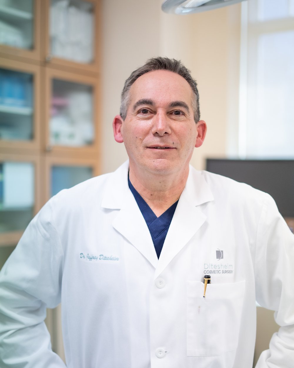 Dr. Jeffrey A. Ditesheim, board-certified plastic surgeon, in the operating room at Ditesheim Cosmetic Surgery, Charlotte NC