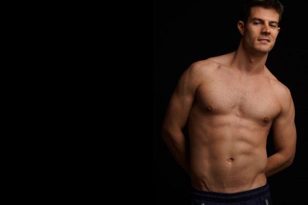 man posing shirtless